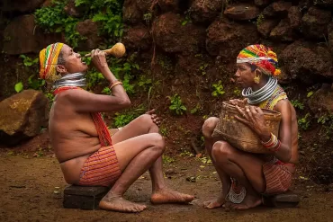 A_Bonda_tribe_of_Odisha_drinking_Mahua_drink